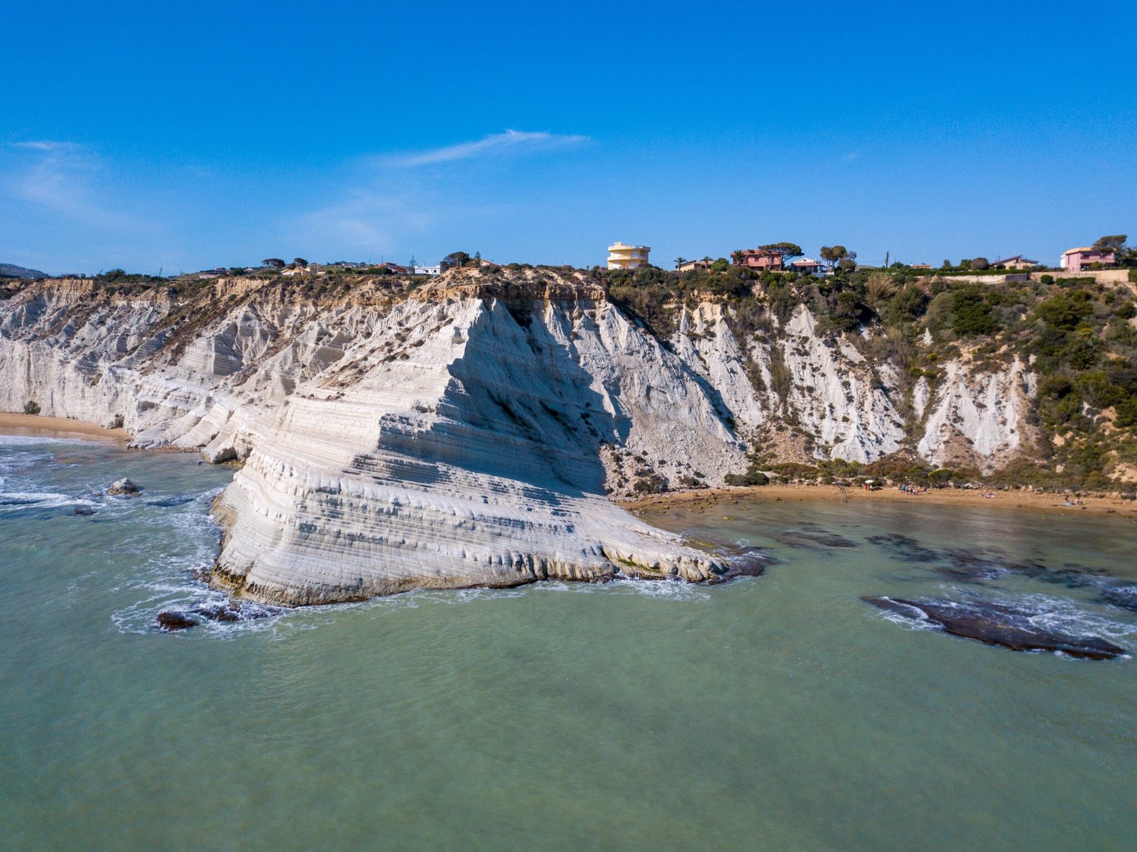 aerial-view-beautiful-white-cliffs-by-sea-sicily-italy-min-2048x1535