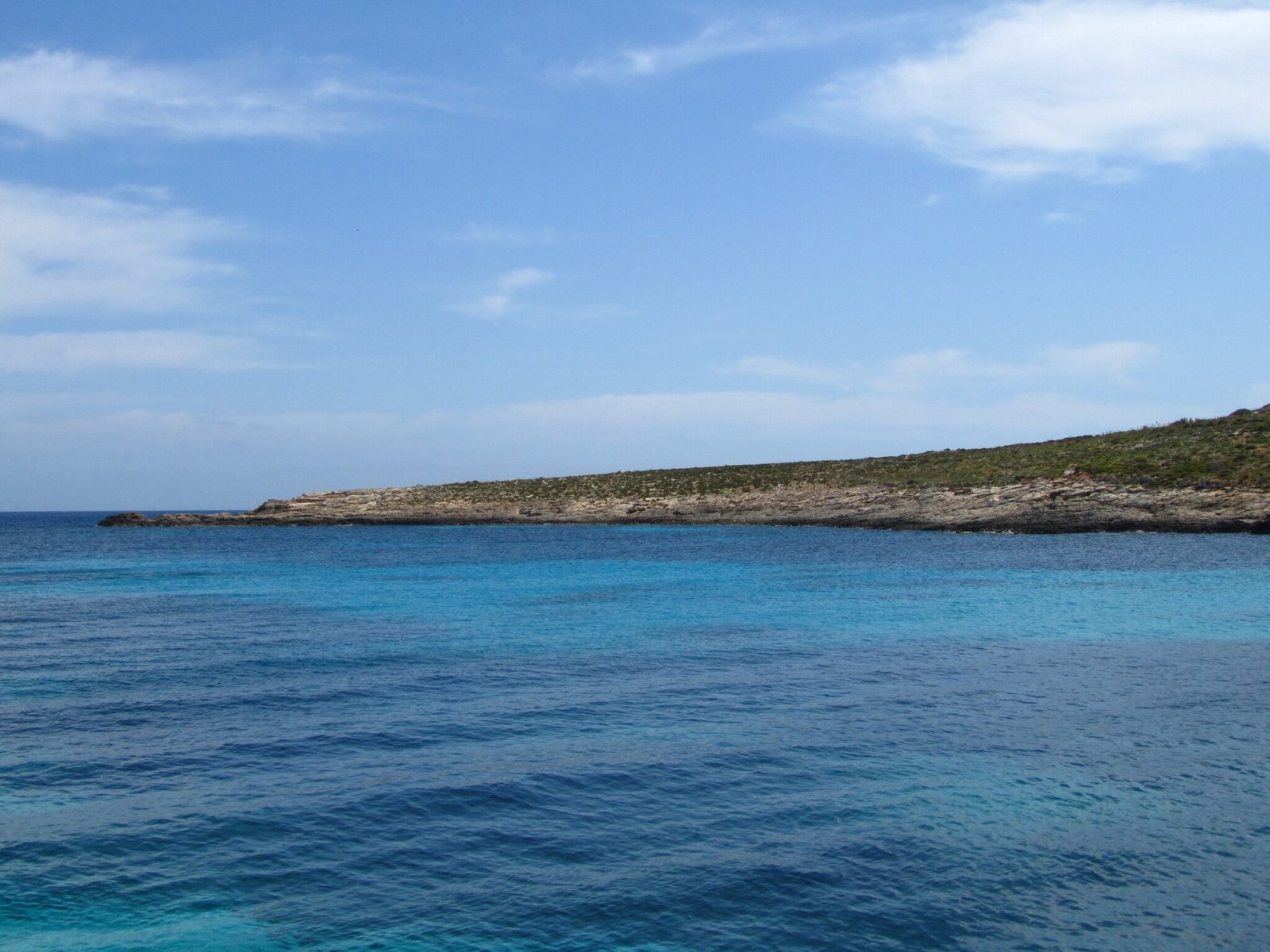 coastline-comino-malta-blue-sky-min-2048x1536